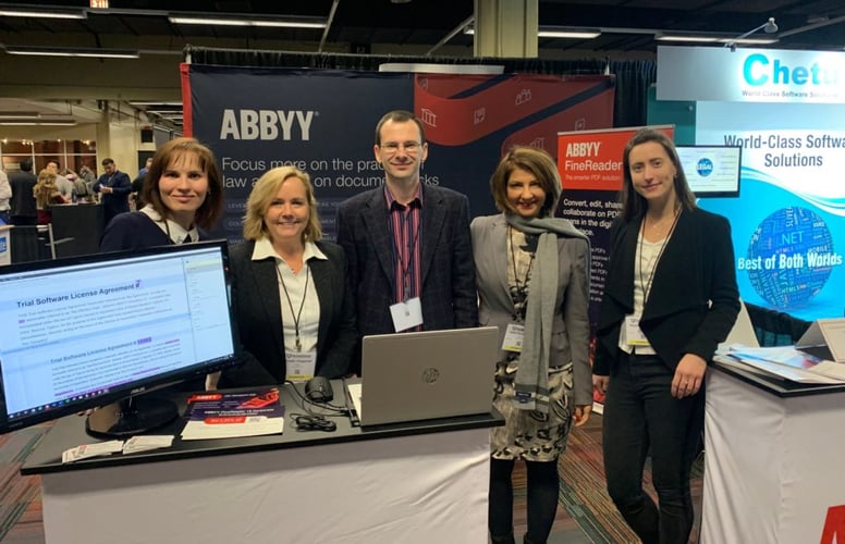 abbyy-team-on-the-booth-scaled-e1584034602212-1024x660